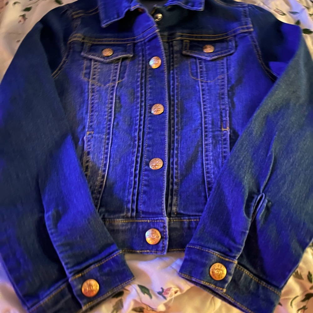 Girls denim jacket, size 8, long sleeves and snap buttons.  NWOT